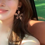 Leopard print holiday flower earrings