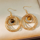 Daiiibabyyy  New Maillard Retro Tiger Eye Stone Round Hollow Earrings Elegant All-match Luxury High Grade Earrings For Women