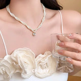 Daiiibabyyy  Retro double-layer pearl necklace light luxury literary niche design high-end sense pendant collarbone high-end neck chain