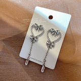 MENGJIQIAO Korean Sweet Pearl Hollow Heart Drop Earrings For Women Girls Fashion Bowknot Crystal Long Pendientes Mujer Jewelry daiiibabyyy