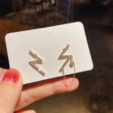2022 New Contracted Asymmetric Modelling Fresh Temperament Drop Earrings Sweet Metal Tassel Fashion Korean Fine Women Earrings daiiibabyyy