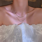 Imitation pearl necklace female 2022 new super fairy double layered clavicle chain light luxury daiiibabyyy
