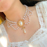 MENGJIQIAO New Vintage Style 2 Layers Pearl Choker Necklace For Women Elegant Bowknot Pendant Wedding Necklace Jewelry daiiibabyyy