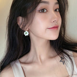 Cute small fresh hollow flower eardrop geometric asymmetry South Korea new 2022 fashion woman earrings party gifts daiiibabyyy