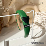 Green~The new olive greenplaid headband is simpleand versatile showing white hair accessories large leather large intestine ring daiiibabyyy