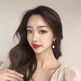 New vintage fantasy resin geometric asymmetrical pearl stud earrings, Korean long tasselled women's earrings 2022 new jewelry daiiibabyyy