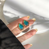 2022 South Korea new geometric hollow tear drop ear stud, simple blue water drop fashion woman's earrings.Party jewelry gifts daiiibabyyy