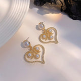 2022 New Fashion Korean Oversized White Pearl Drop Earrings for Women Bohemian Golden Heart Zircon Wedding Earrings Jewelry Gift daiiibabyyy