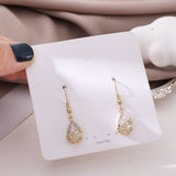 Fashion Women's Ear Hook 2022 New Hollow-out Flower Earrings, Korean Push-back Zinc Alloy Vintage Metal Irregular AA145 daiiibabyyy