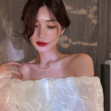 Imitation pearl necklace female 2022 new super fairy double layered clavicle chain light luxury daiiibabyyy