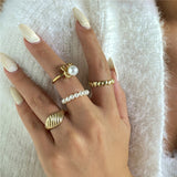 Daiiibabyyy 4pcs/set Vintage Pearl Spider Finger Rings Gold Punk Geometric Bread Heart Shape Rings For Women Party Jewelry Gift
