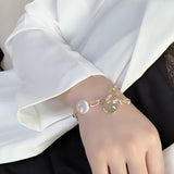 South Korea's new metal pearl bracelet, rose pendant, simple fashion women's bracelet 2022 new jewelry daiiibabyyy