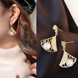 Exquisite inlaid zirconium hollow fan earrings gold electroplating women's prom party earrings Korean jewelry daiiibabyyy