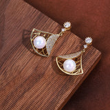 Exquisite inlaid zirconium hollow fan earrings gold electroplating women's prom party earrings Korean jewelry daiiibabyyy