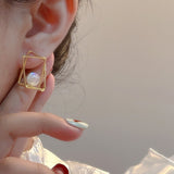 Daiiibabyyy Hollow Out Geometric Earrings With Single Bubble Pearl Elements Creative New Fashion Jewelry Wholesale
