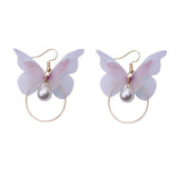 Korean Retro Asymmetric Butterfly Imitation Pearl Earrings Fashion Round Flower Brincos Long Statement Wings Earrings Jewelry daiiibabyyy