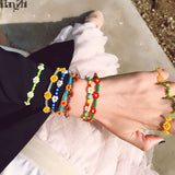 HangZhi  New Korean Cute Flowers Daisy Bracelets Transparent Colorful Beaded Handmade Elastic Wristband for Women Jewelry